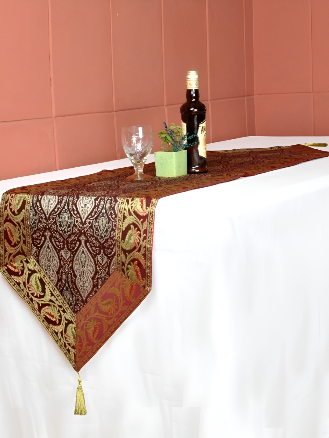 

Lal Haveli Maroon & Gold Toned Floral Silk Brocade Table Runner