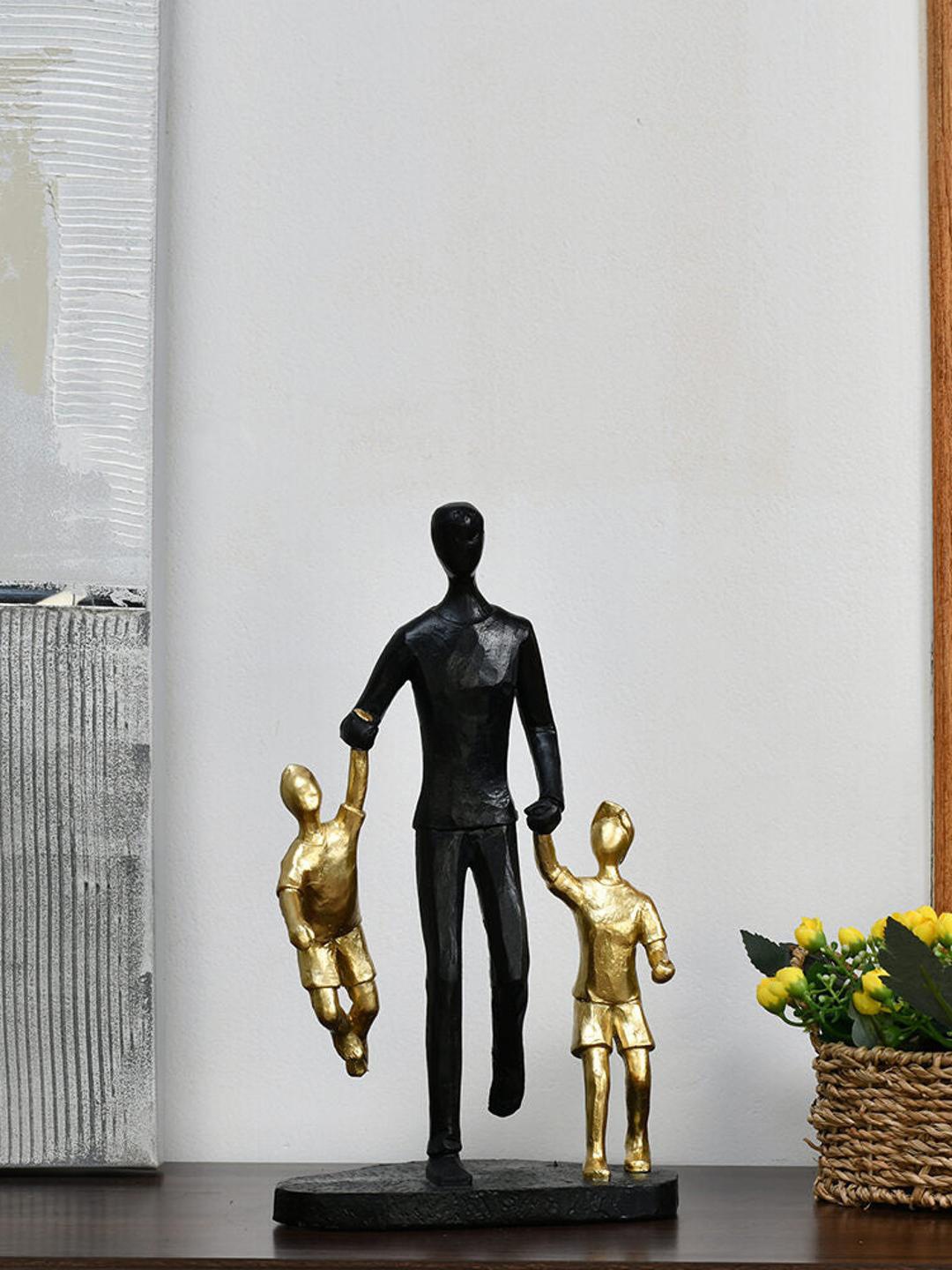 

Athome by Nilkamal Black & Gold Dad With Two Kids Decorative Showpiece