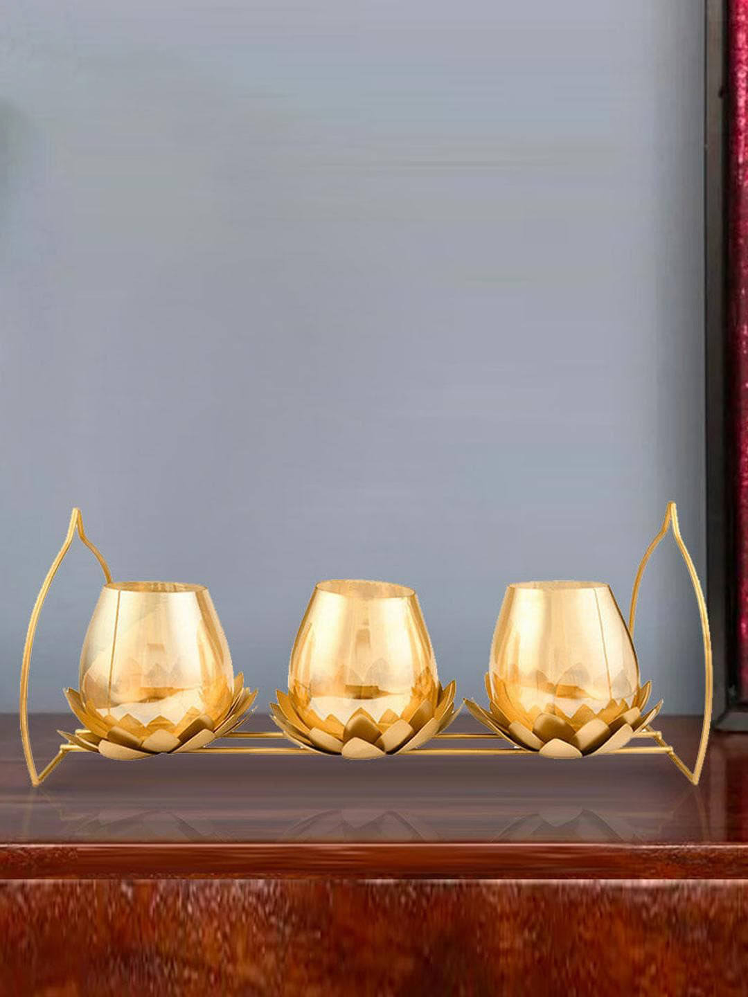 

Athome by Nilkamal Metal Gold Toned Trio Lotus Candle Holder