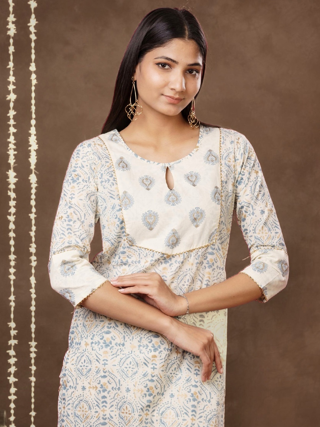 

mokshi Beige & Blue Ethnic Motifs Printed Straight Kurta With Palazzo