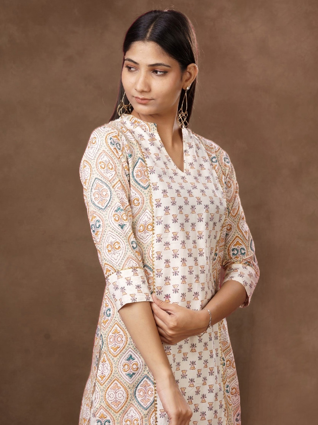 

mokshi Beige & Blue Ethnic Motifs Printed Straight Kurta With Palazzo