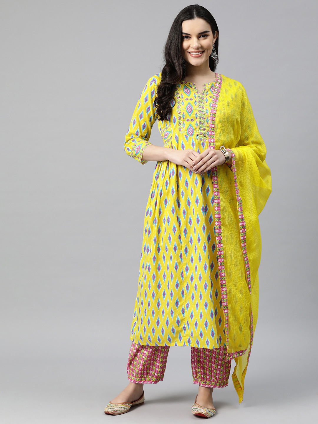 

Readiprint Fashions Women Printed Mirror Work Kurta with Palazzos & With Dupatta, Yellow