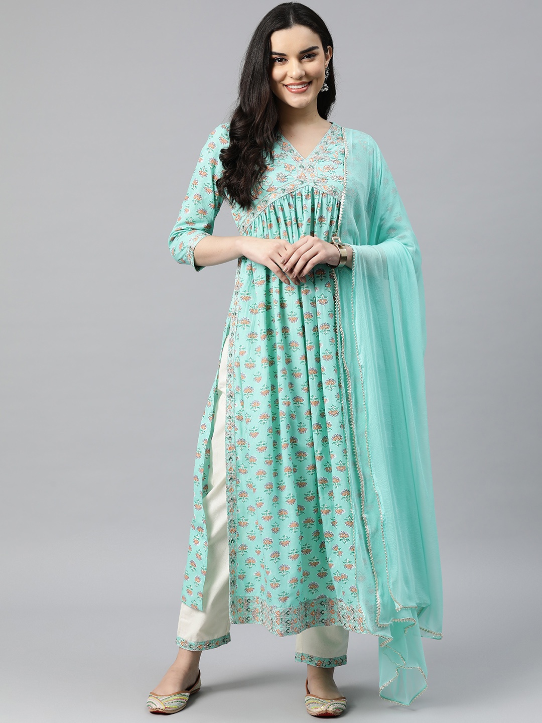 

Readiprint Fashions Women Printed Thread Work Cotton Kurta with Palazzos & With Dupatta, Turquoise blue