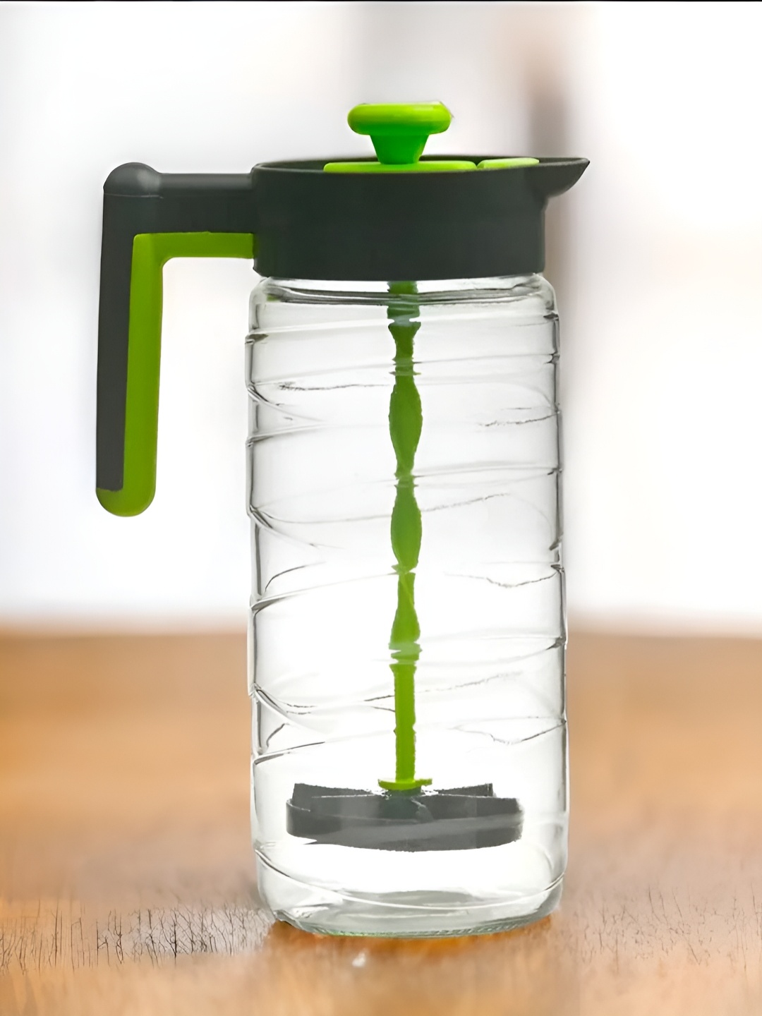 

Athome by Nilkamal Transparent Green Glass Jug with Mudller 1.54 L