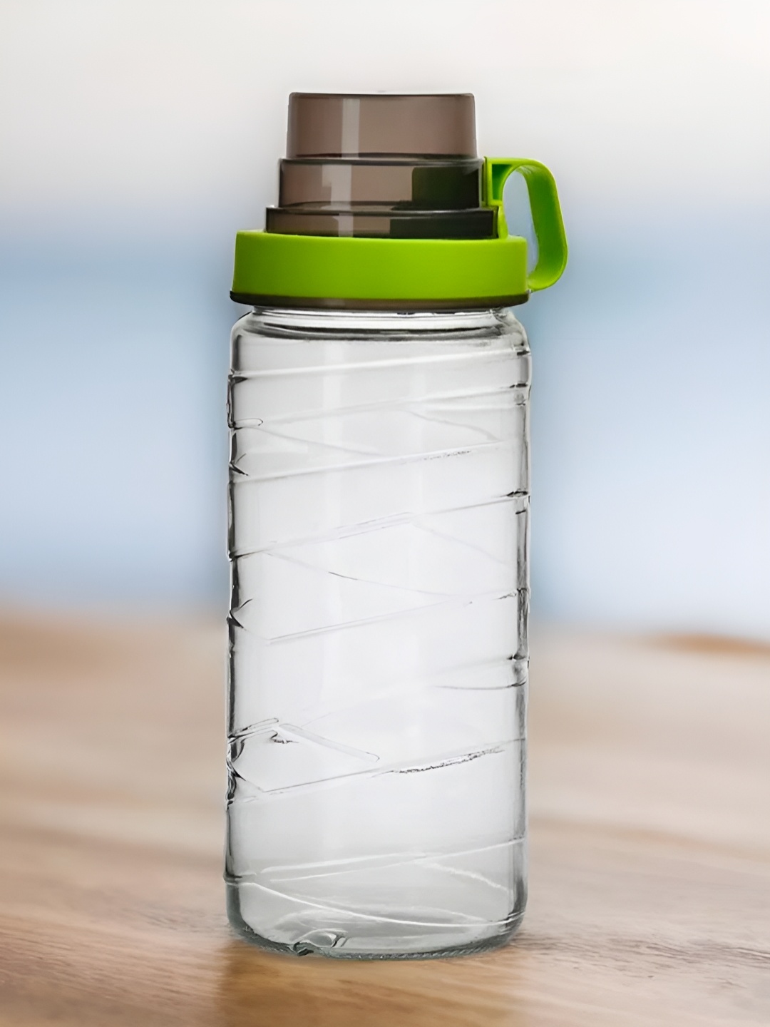 

Athome by Nilkamal Green Glass Canister With Measure Cup Lid 1.5 L