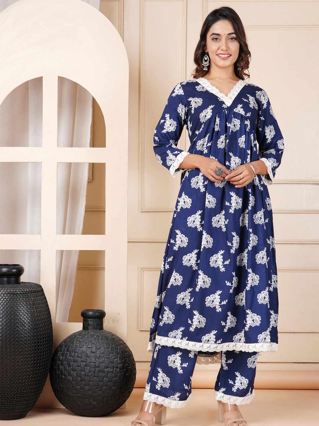 

KALINI V-neck Gotta Patti Floral Printed A-line Flared Kurta with Palazzos, Blue