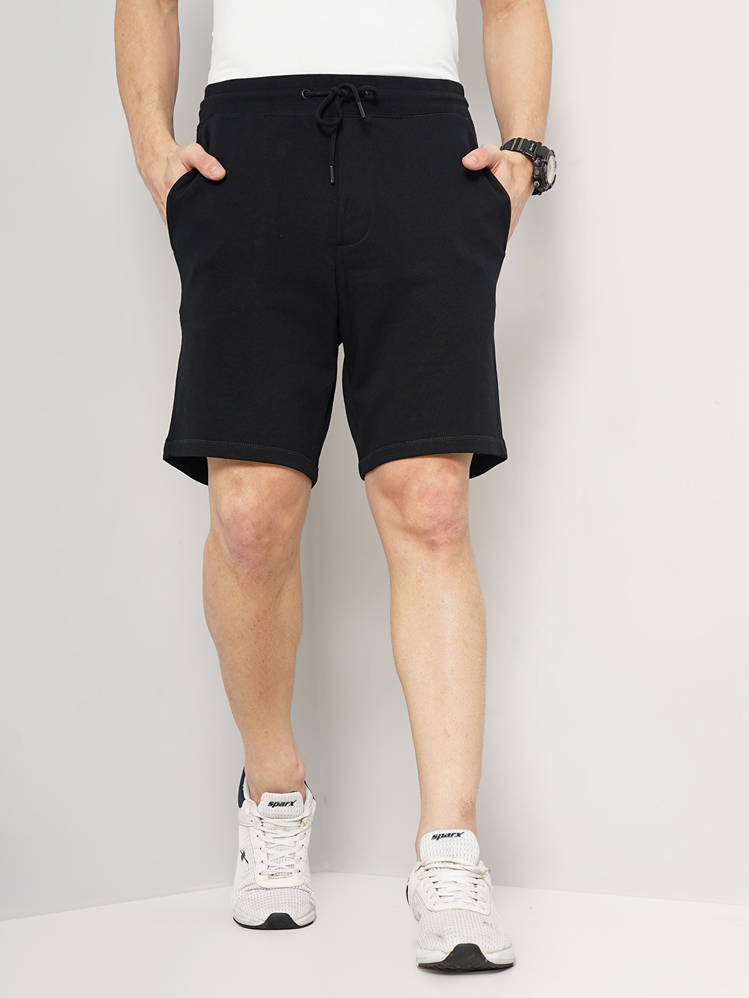 

Celio Men Mid Rise Above knee Length Cotton Sports Shorts, Black