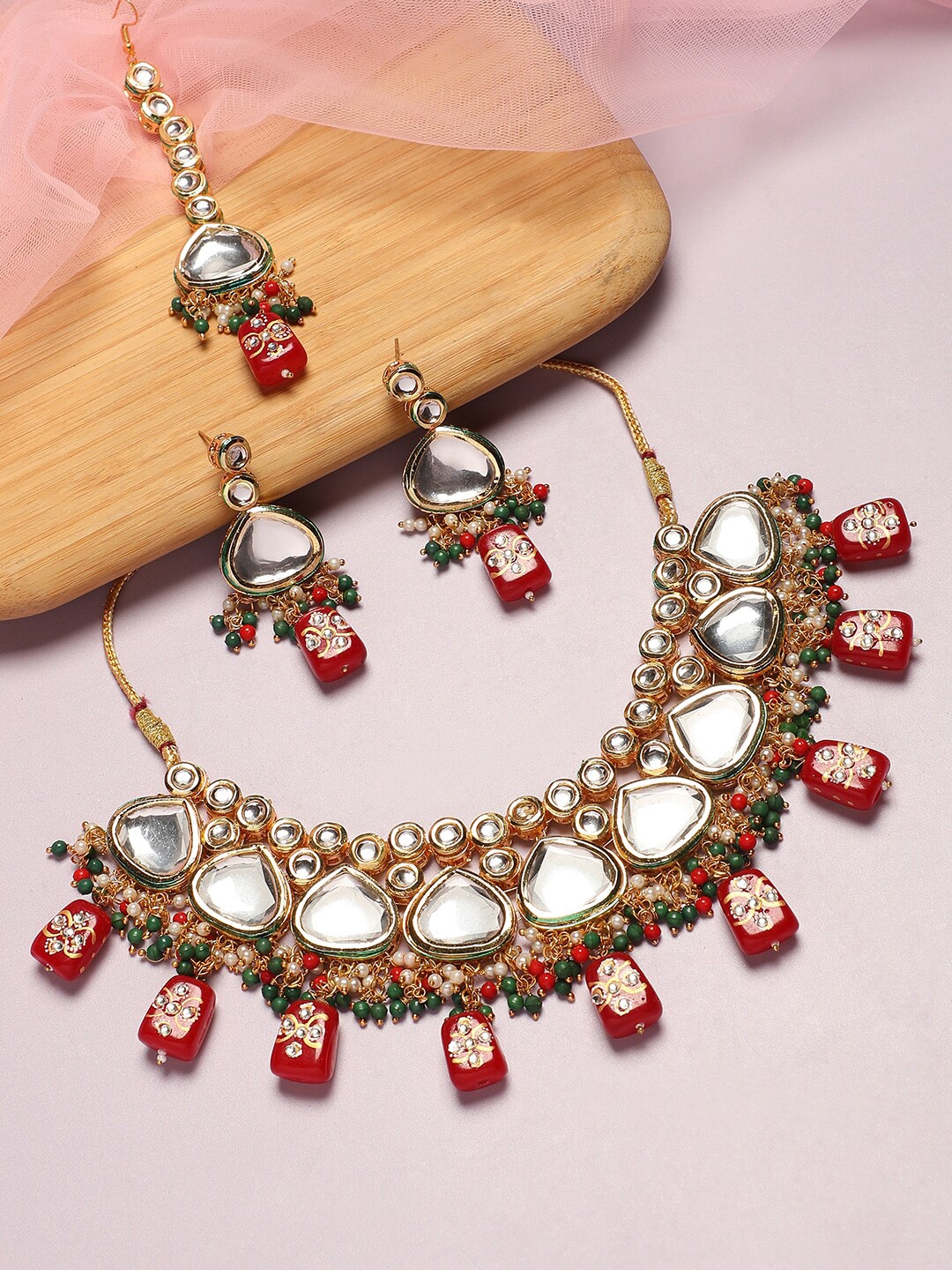 

Anouk Gold Plated Kundan Studded & Beaded Jewellery Set