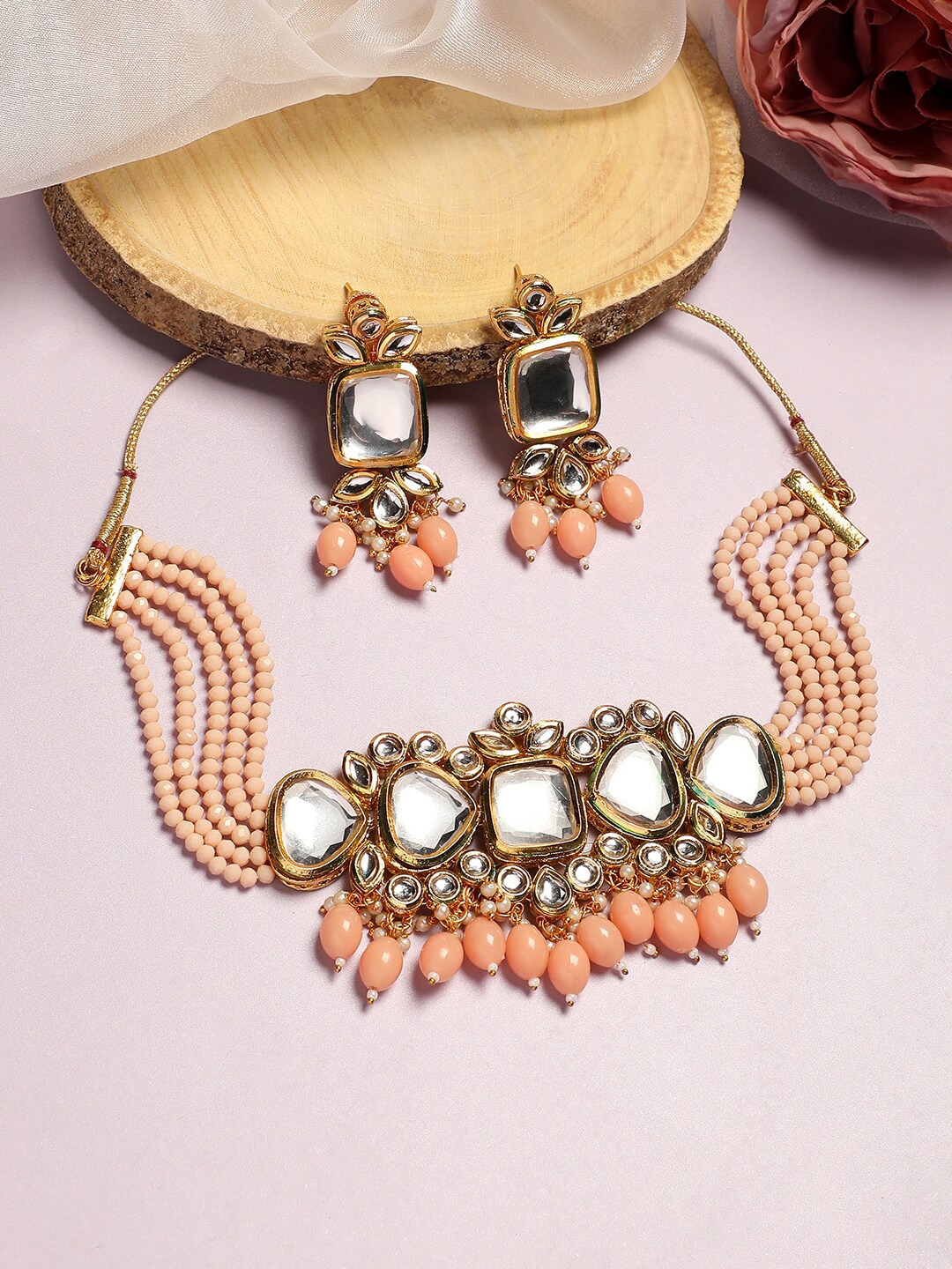 

Anouk Peach Coloured Gold-Plated Kundan-Studded & Beaded Necklace & Earrings