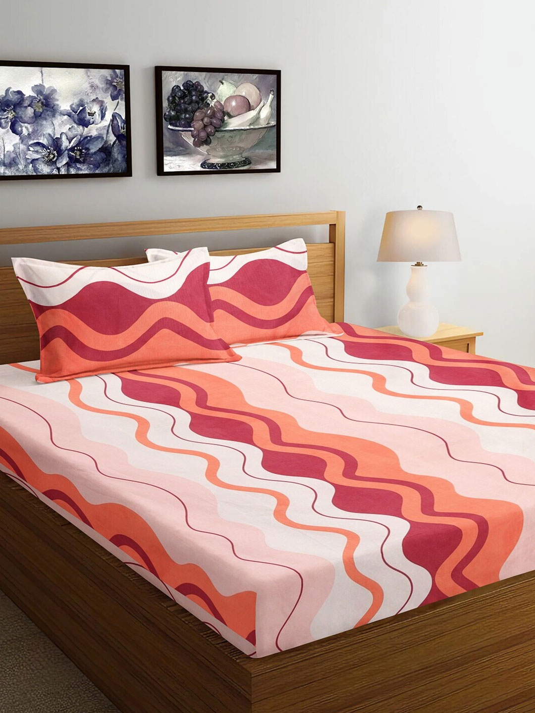 

Arrabi Pink & Peach Coloured Striped 300 TC King Bedsheet with 2 Pillow Covers 130 GSM