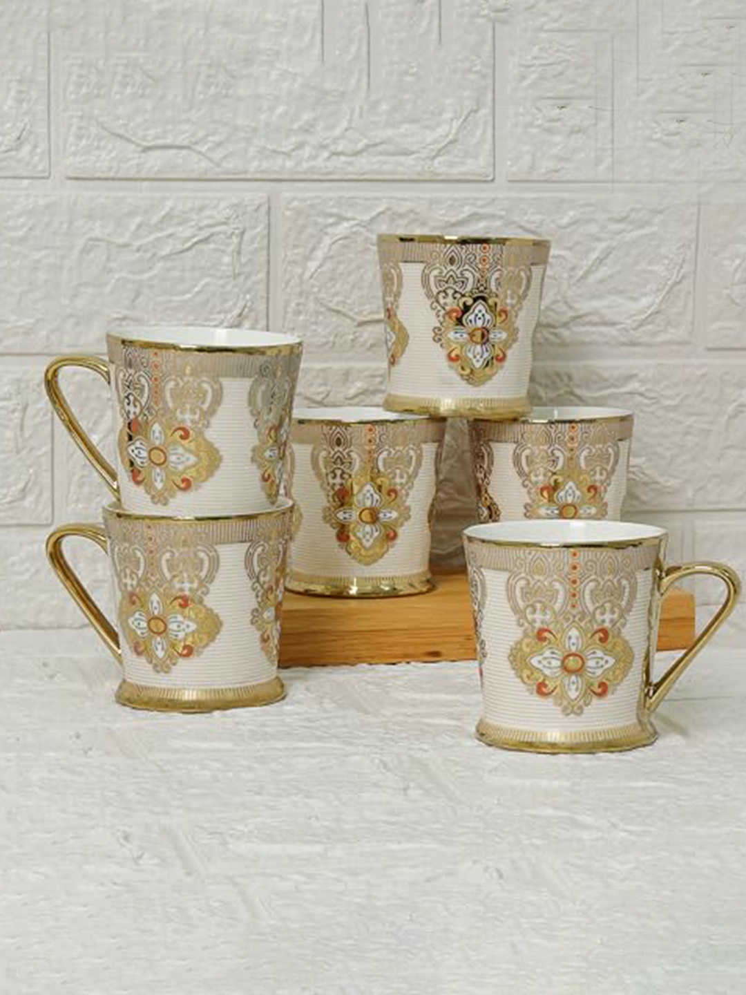 

Femora Gold Toned & White 6 Pieces Ethnic Motifs Printed Bone China Glossy Cups 180ml