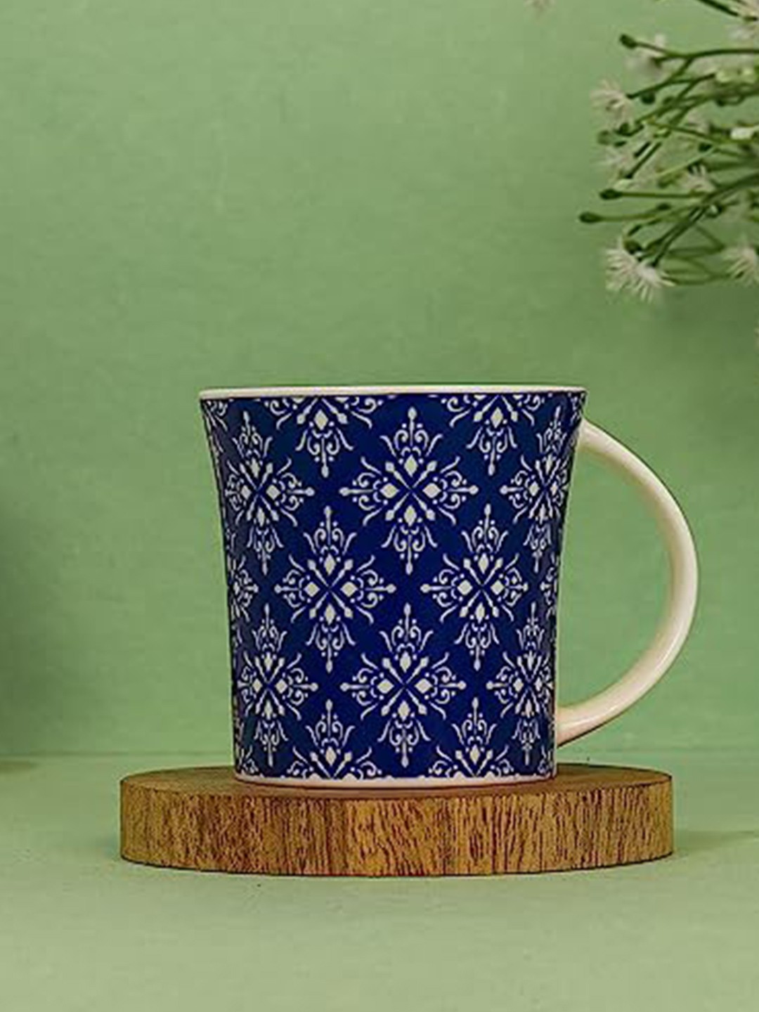 

Femora Blue & White 6 Pieces Ceramic Printed Ceramic Glossy Cups 160 ml