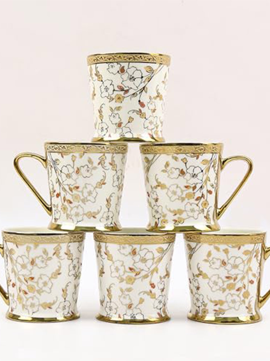 

Femora Gold Toned 6 Pieces Ethnic Motifs Printed Ceramic Glossy Cups 180 ml