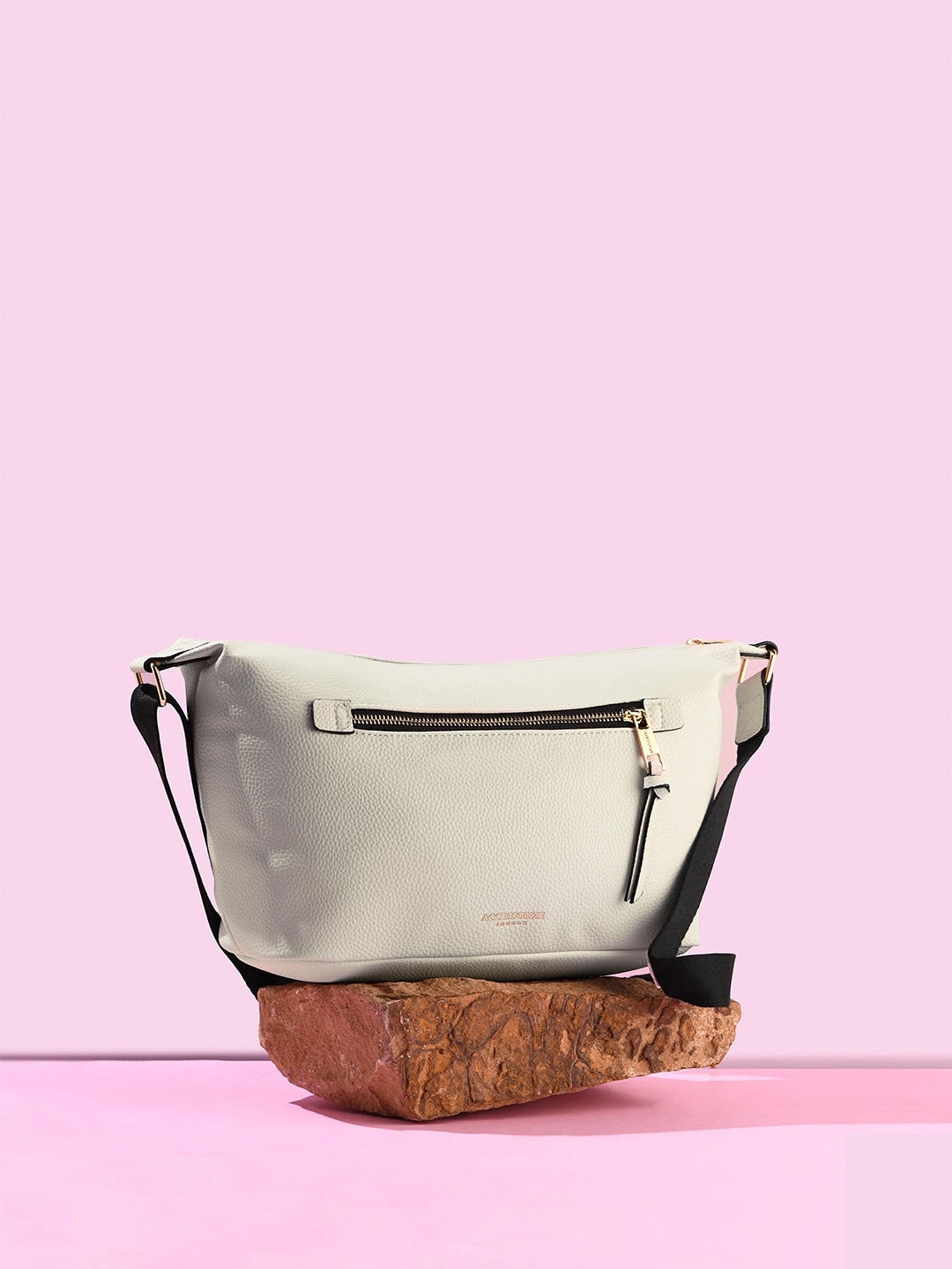 

Accessorize London Solid Slouchy Sling Bag, Cream