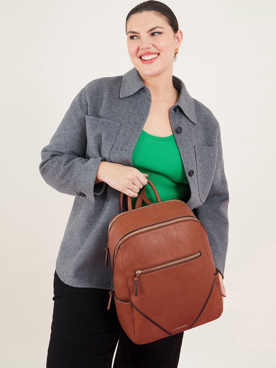 

Accessorize London Women Solid Synthetic Leather Backpack, Tan