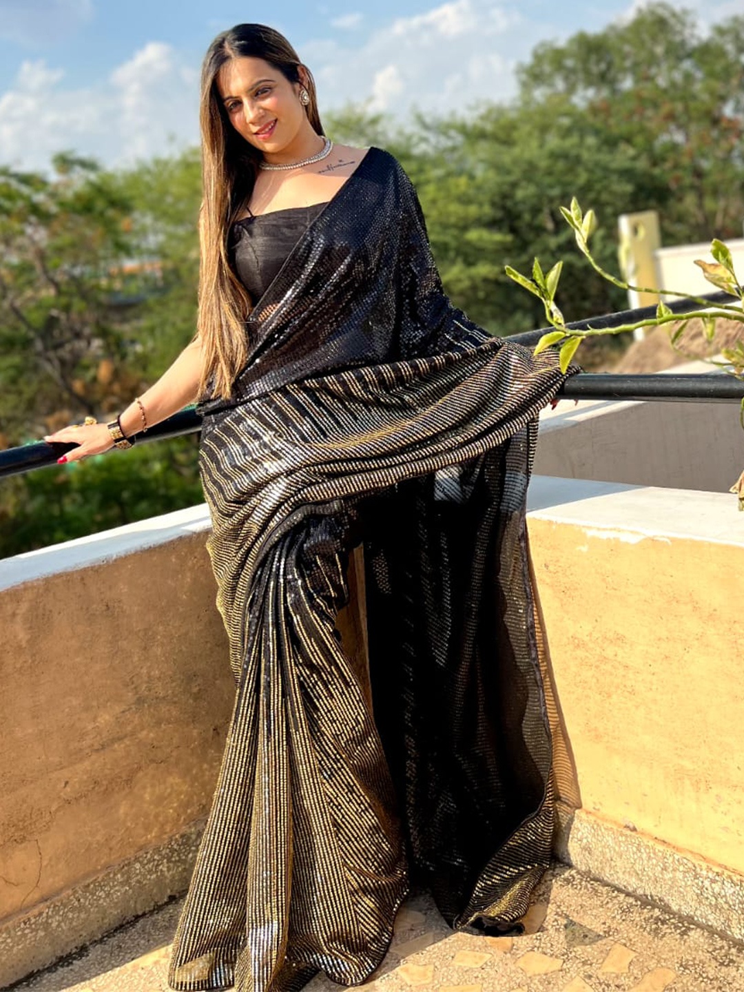 

Inithi Embellished Embroidered Striped Pure Georgette Saree, Black