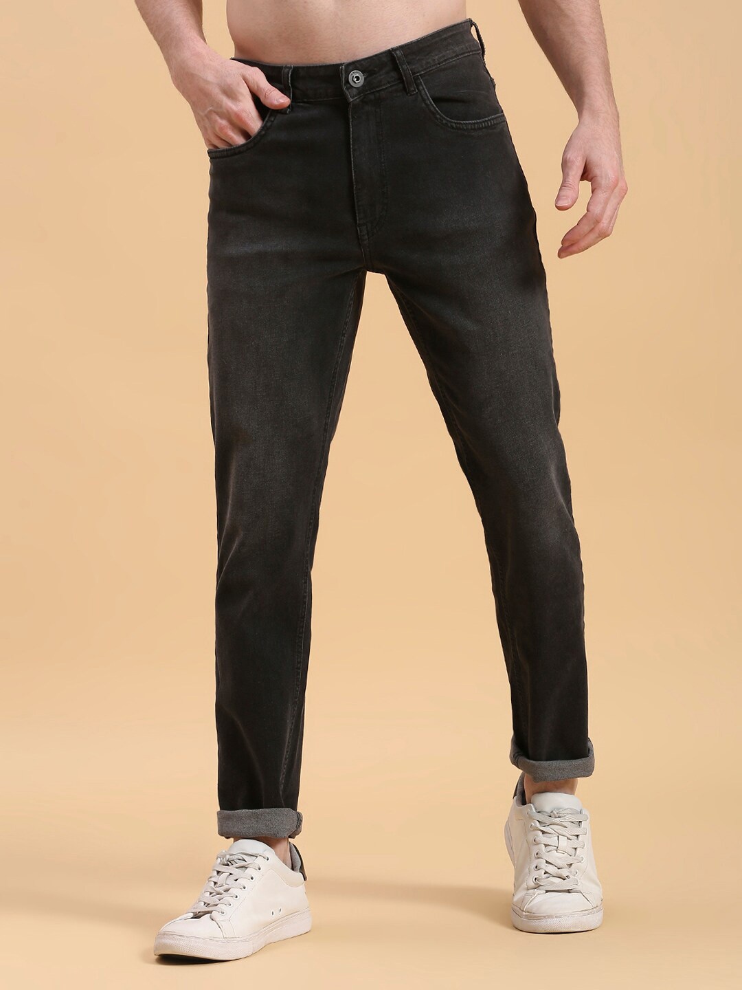 

The Roadster Lifestyle Co. Men Black Super Tapered Fit Light Fade Stretchable Jeans