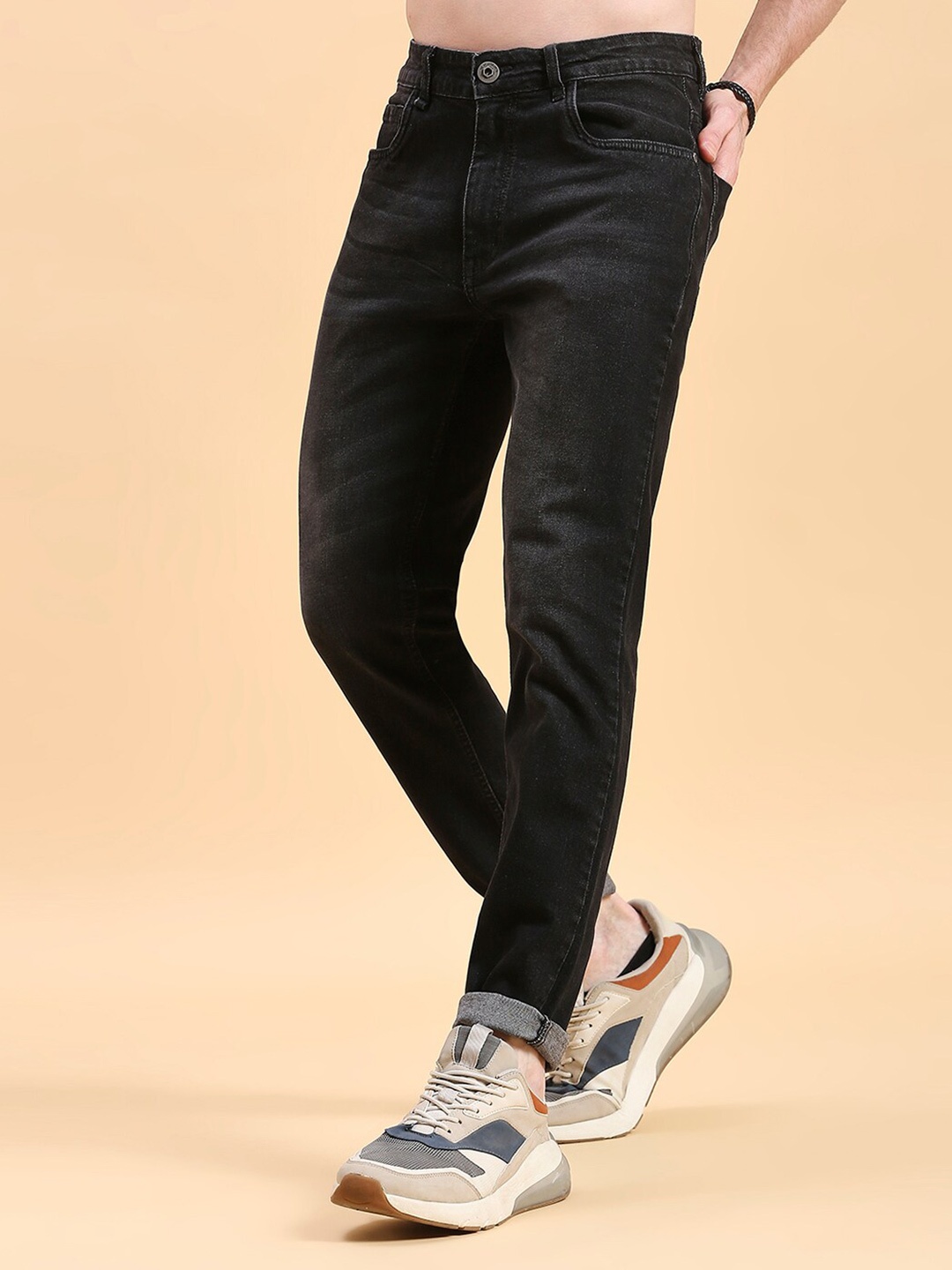 

The Roadster Lifestyle Co. Men Black Super Tapered Fit Mid-Rise Stretchable Jeans