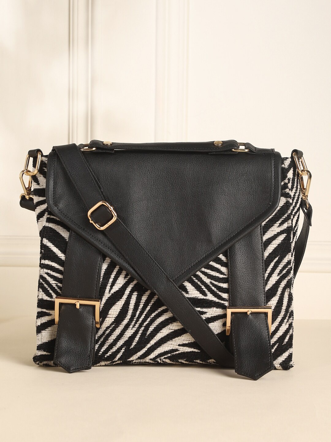 

DEEBACO Animal Printed Structured Sling Bag, Black