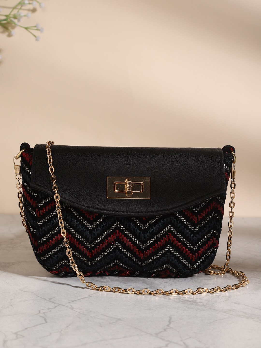 

DEEBACO Geometric Embroidered Structured Sling Bag, Black