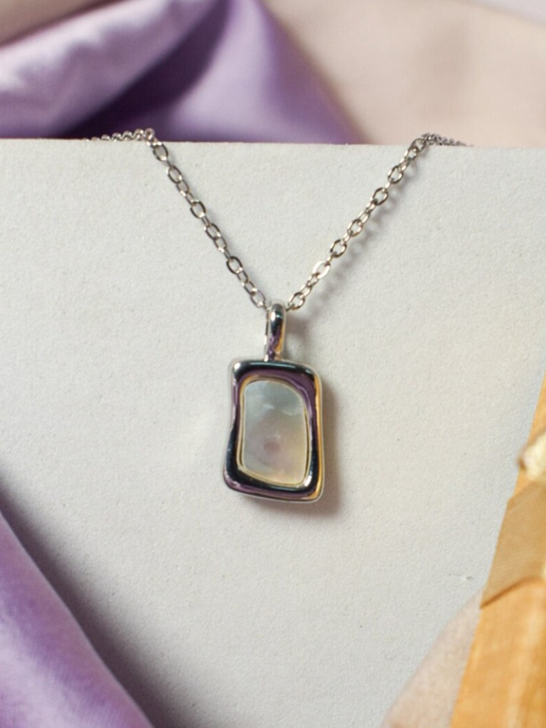 

DressBerry Silver-Toned Silver-Plated Geometric Stainless Steel Pendant with Chain