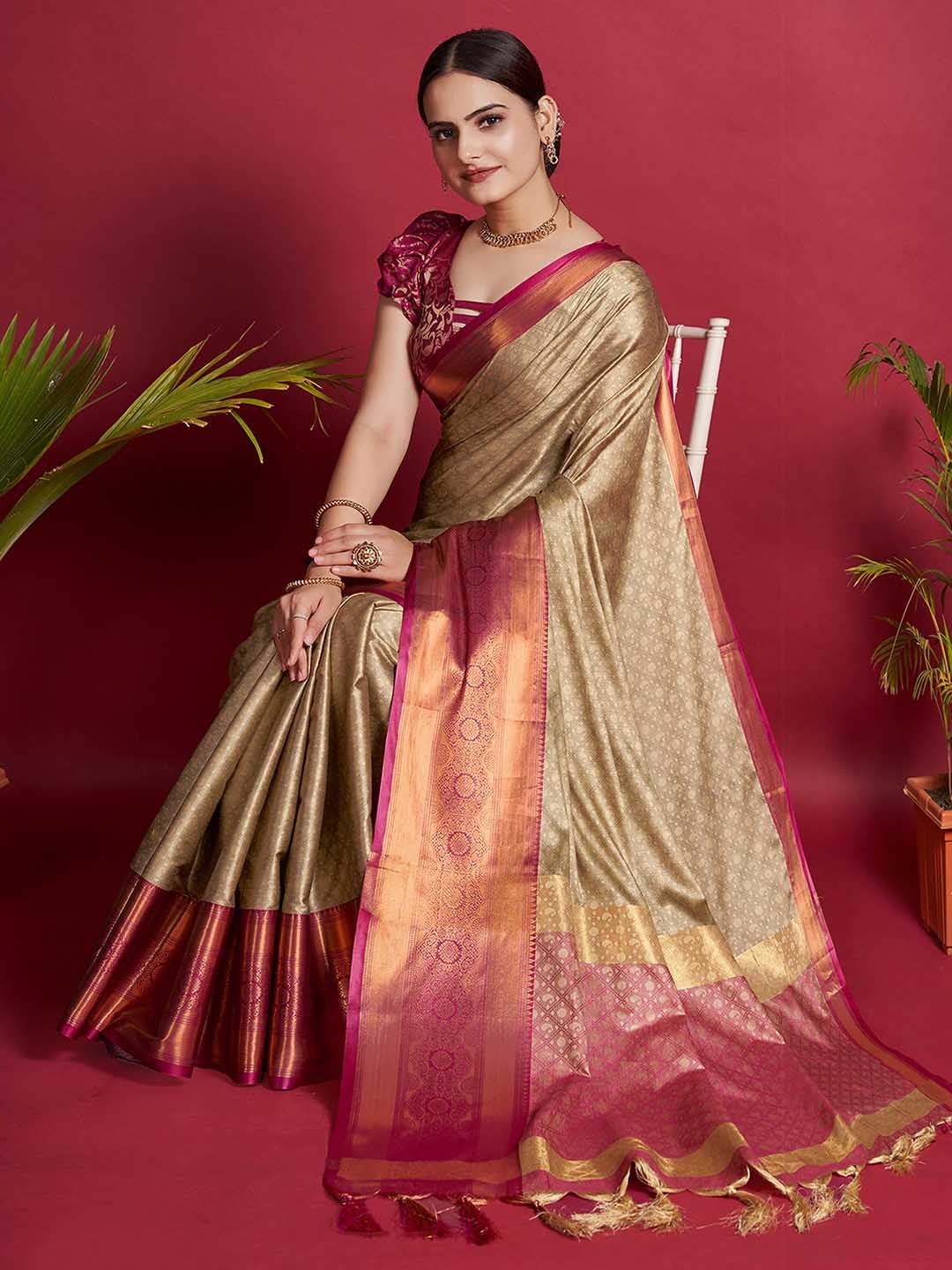 

Mitera Beige Ethnic Motifs Zari Woven Design Saree