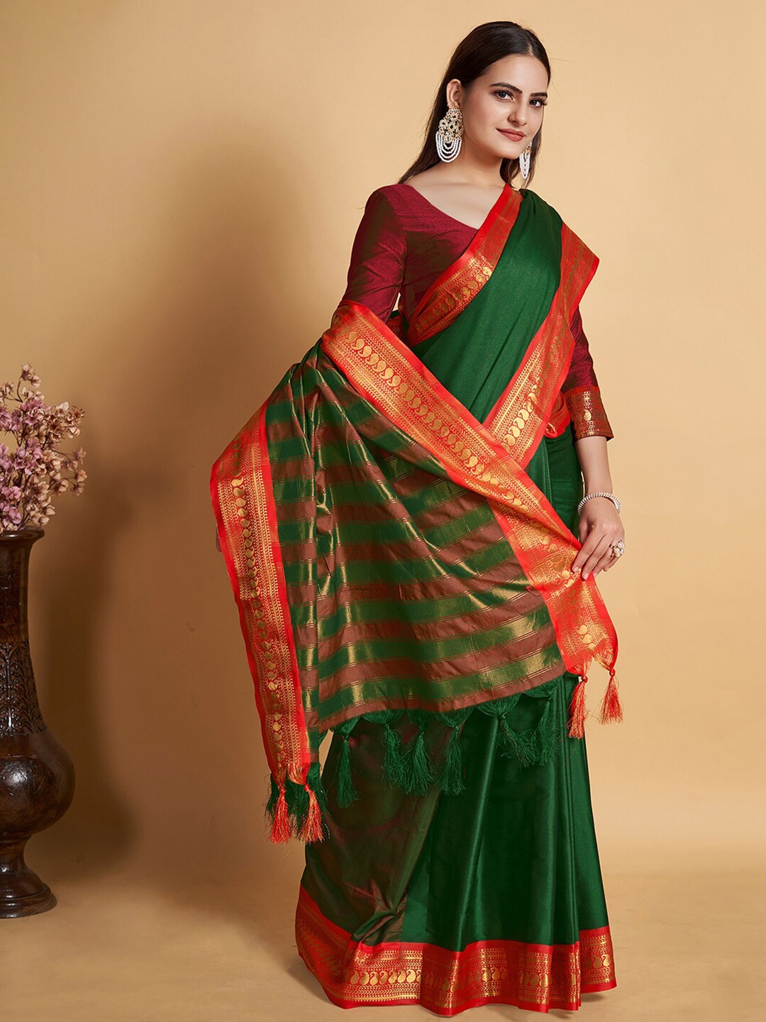 

Mitera Green Zari Woven Design saree