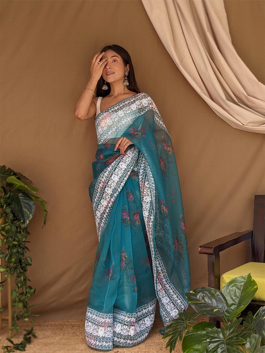 

Mitera Teal Floral Printed Gotta Patti Embellished Organza Saree