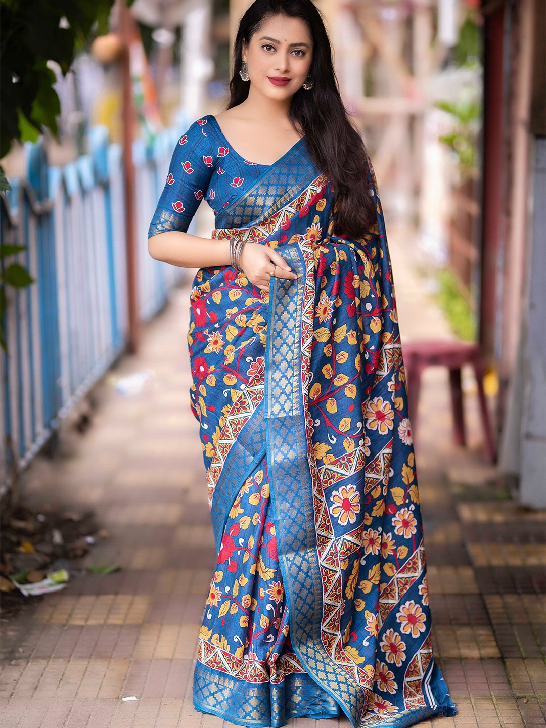 

Mitera Blue Kalamkari Printed Zari Woven Design Saree