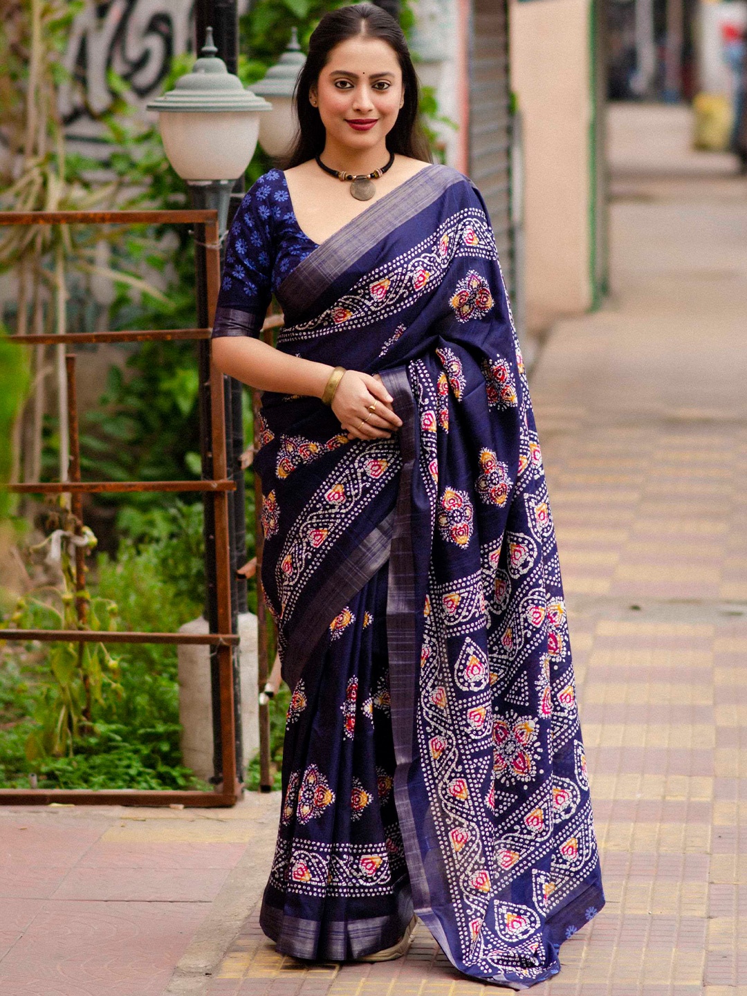 

Mitera Blue Bandhani Printed Zari Saree