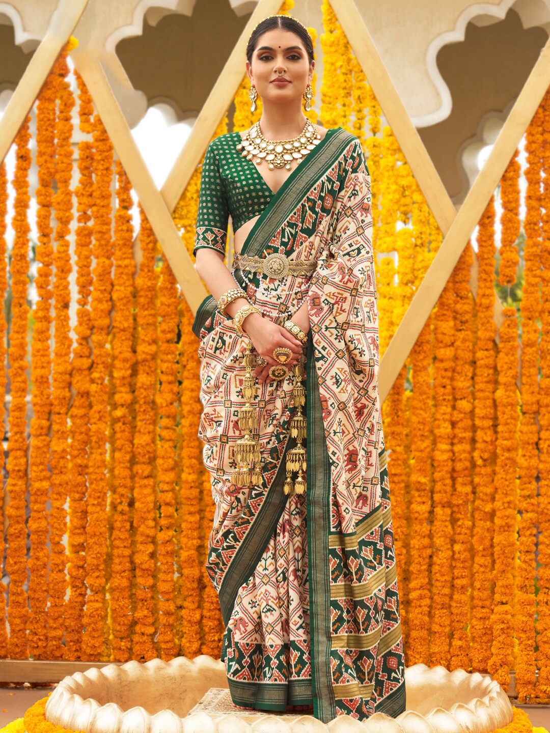 

Anouk Ethnic Motifs Printed Designer Patola Saree, Cream