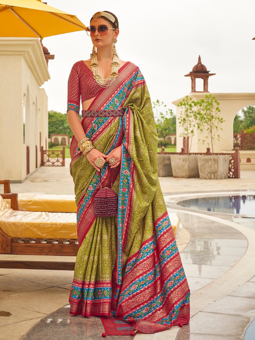 

Anouk Ethnic Motifs Printed Designer Patola Saree, Olive