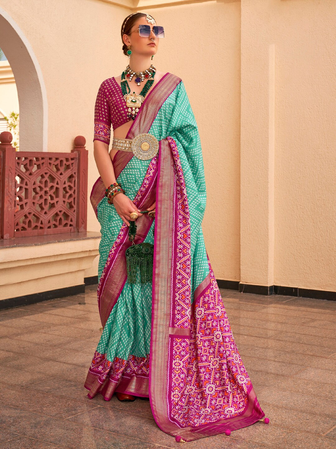 

Anouk Ethnic Motifs Printed Woven Design Designer Ikat Saree, Turquoise blue