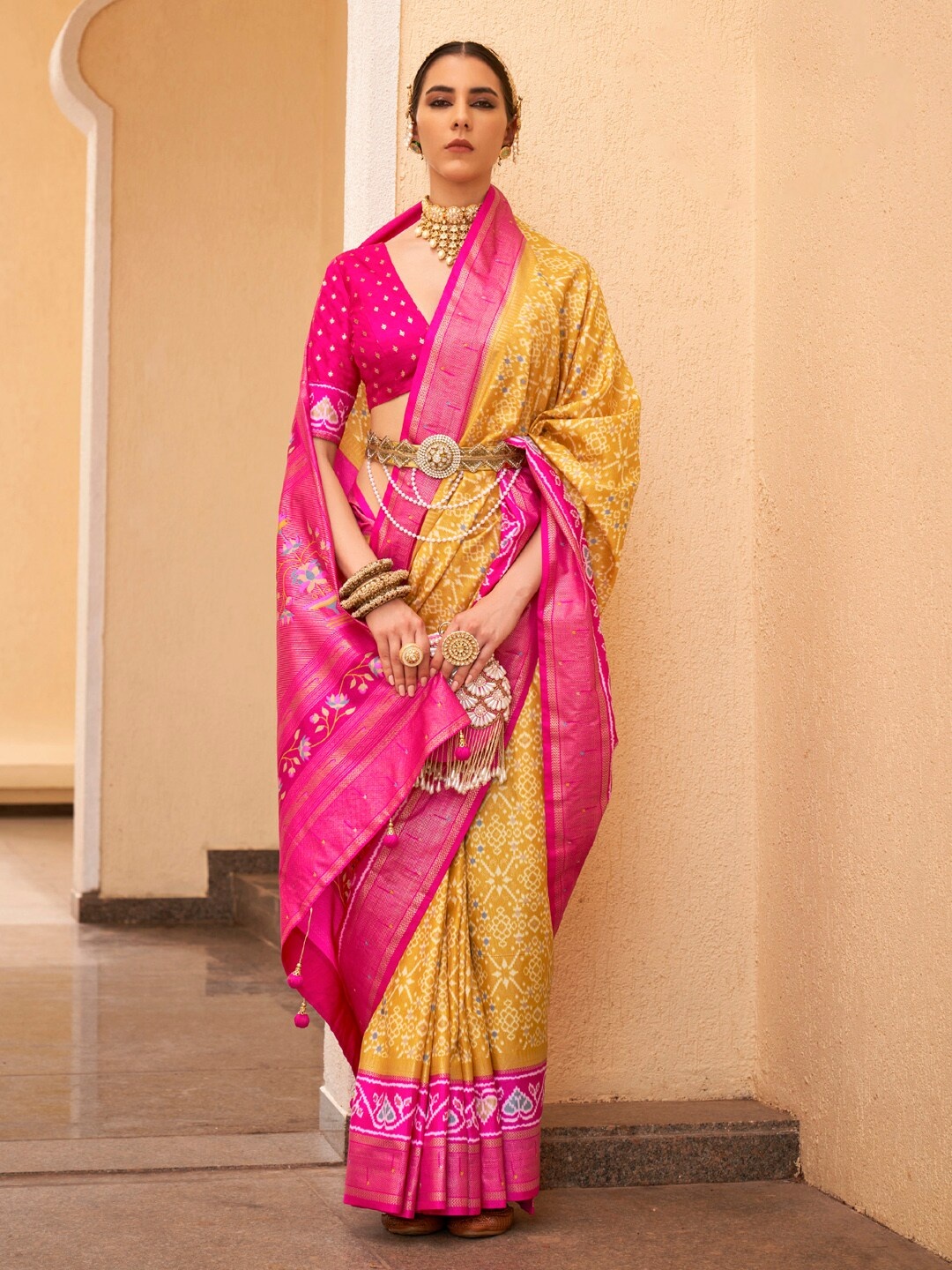 

Anouk Ethnic Motifs Printed Designer Patola Saree, Mustard