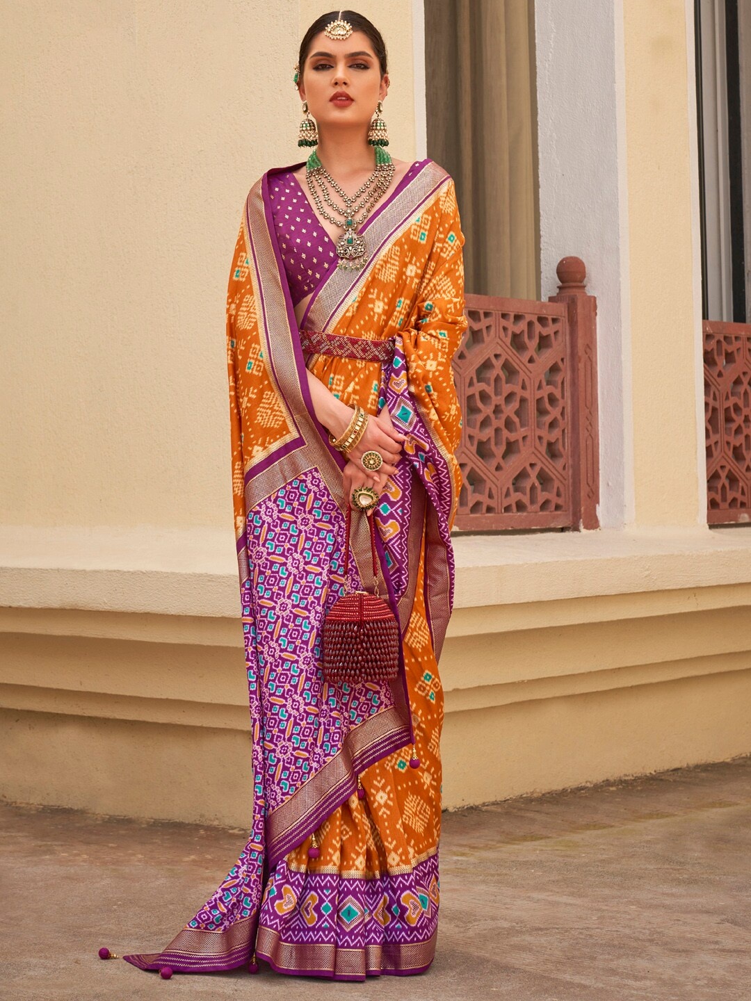 

Anouk Ethnic Motifs Printed Designer Patola Saree, Mustard
