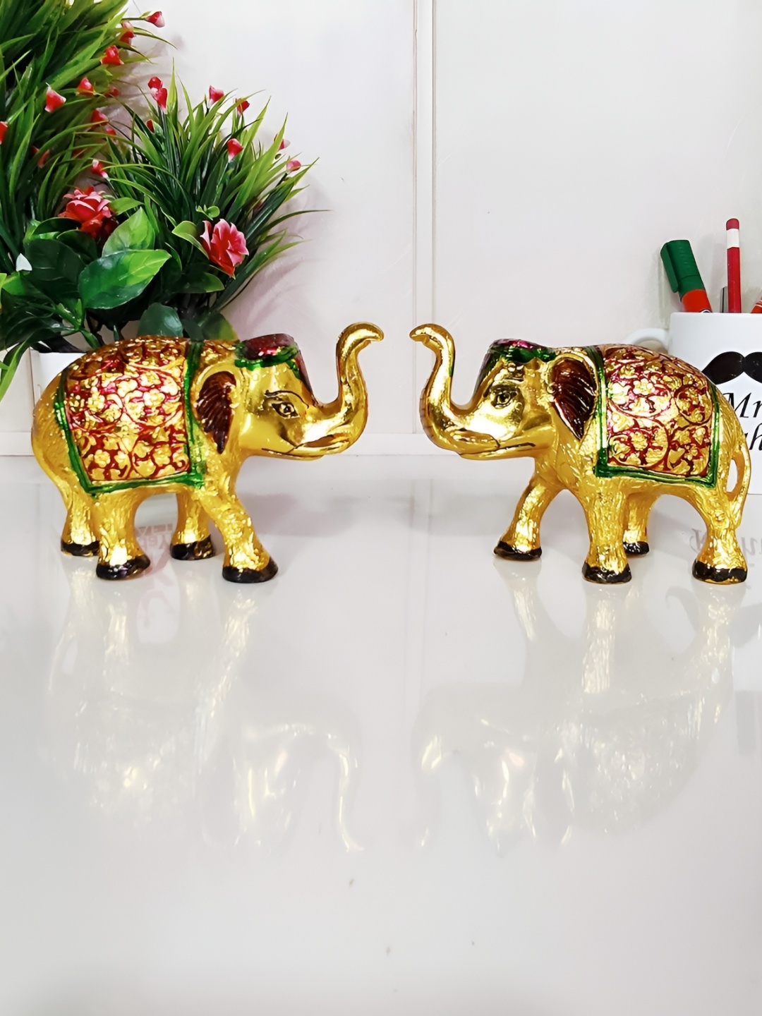 

Kridaykraft Gold toned 2 Pcs Metal Medium Showpiece