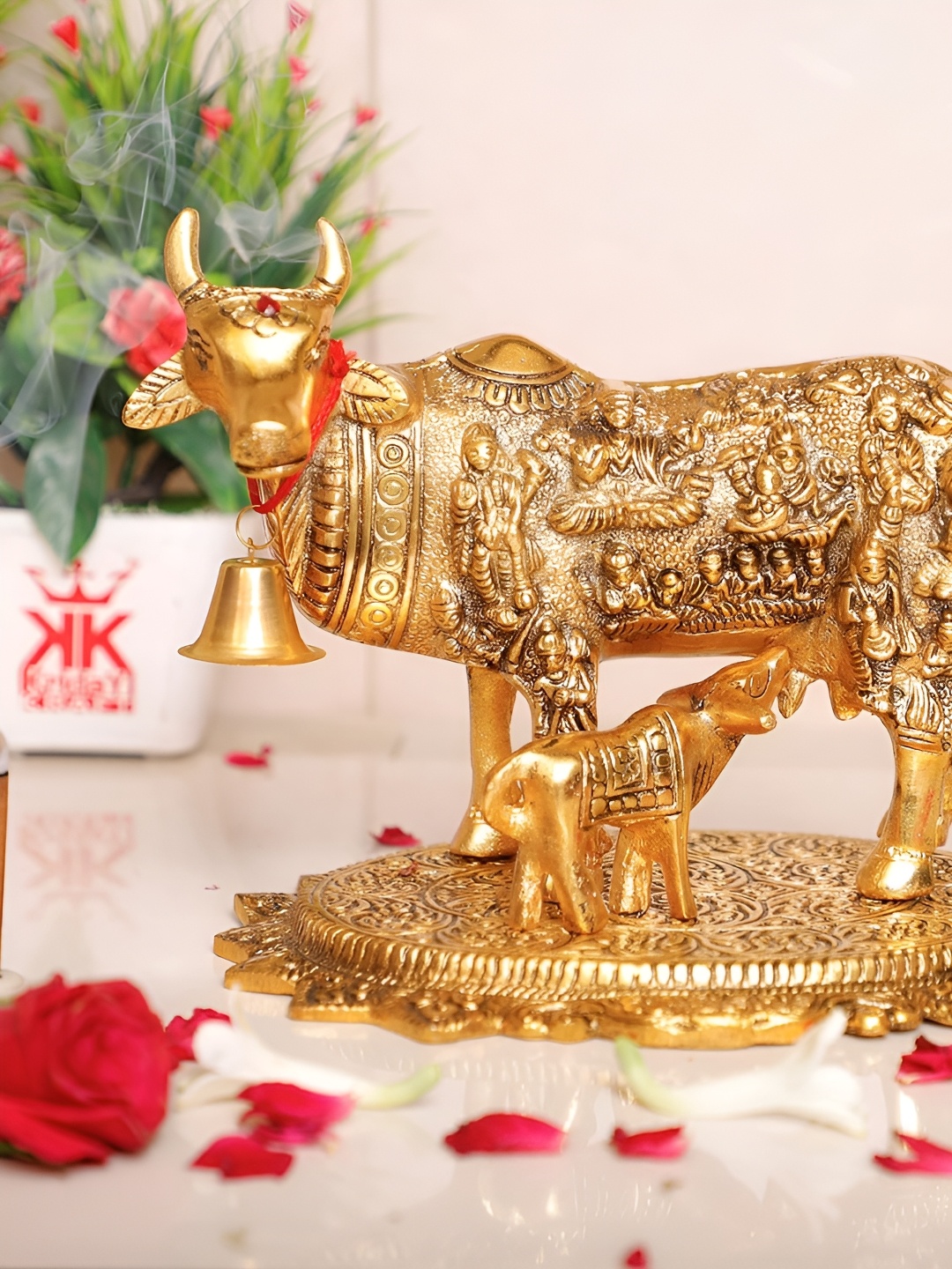 

Kridaykraft Gold-Toned Metal Small Kamdhenu Cow Idol Showpiece