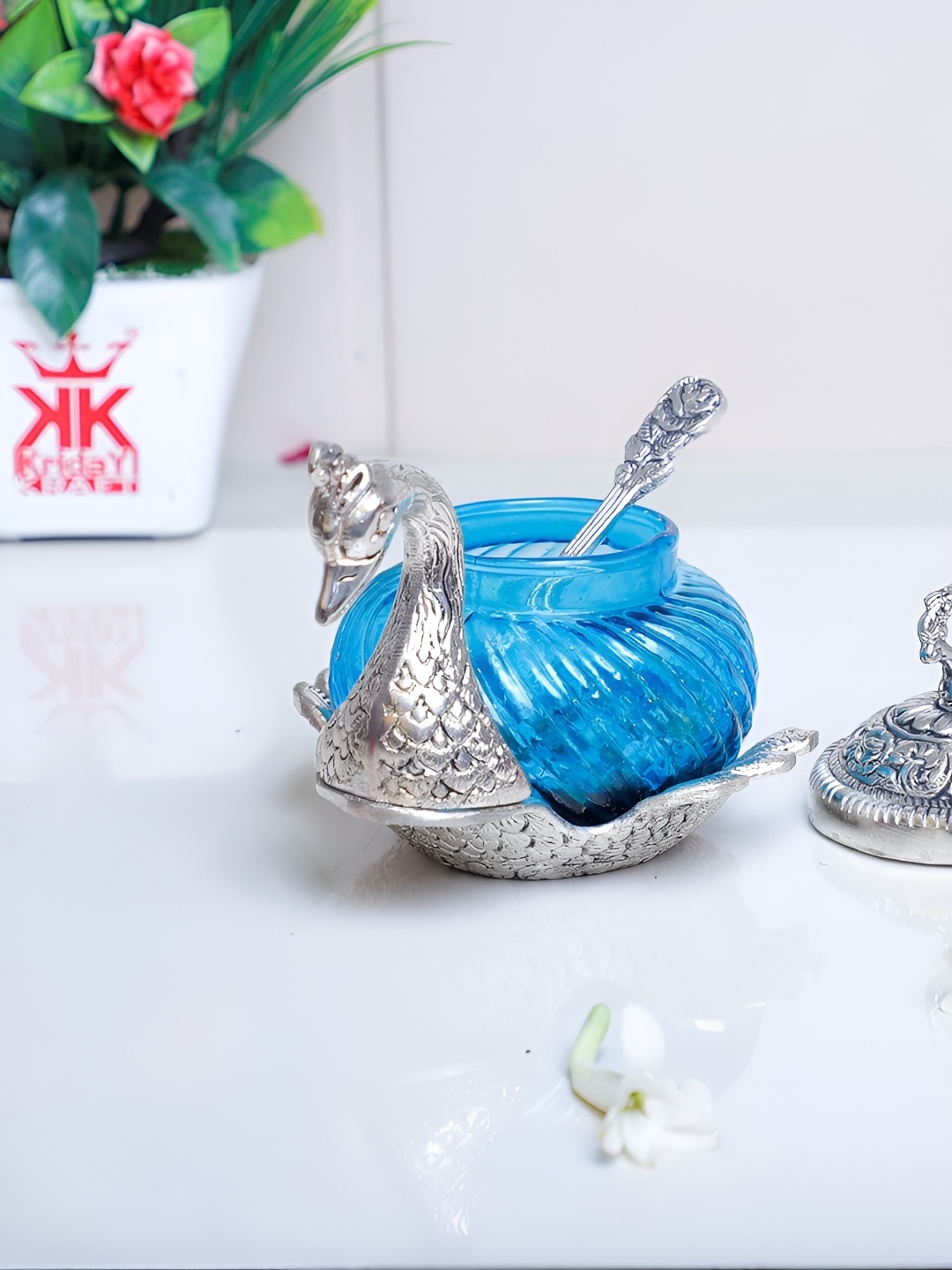 

Kridaykraft Silver Toned & Blue Metal Medium Showpiece