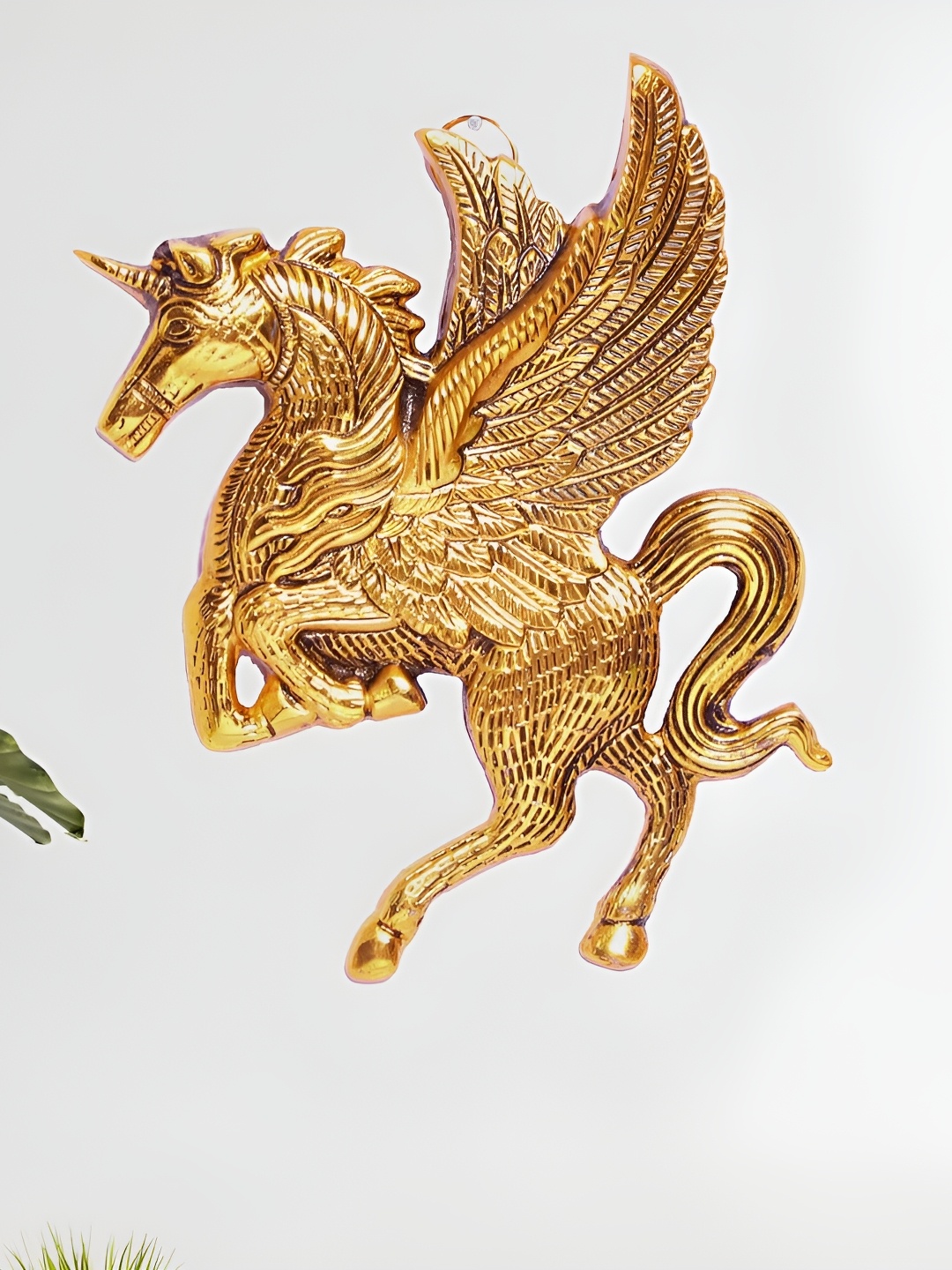 

Kridaykraft Gold Toned Flying Horse Textured Figurine Showpiece