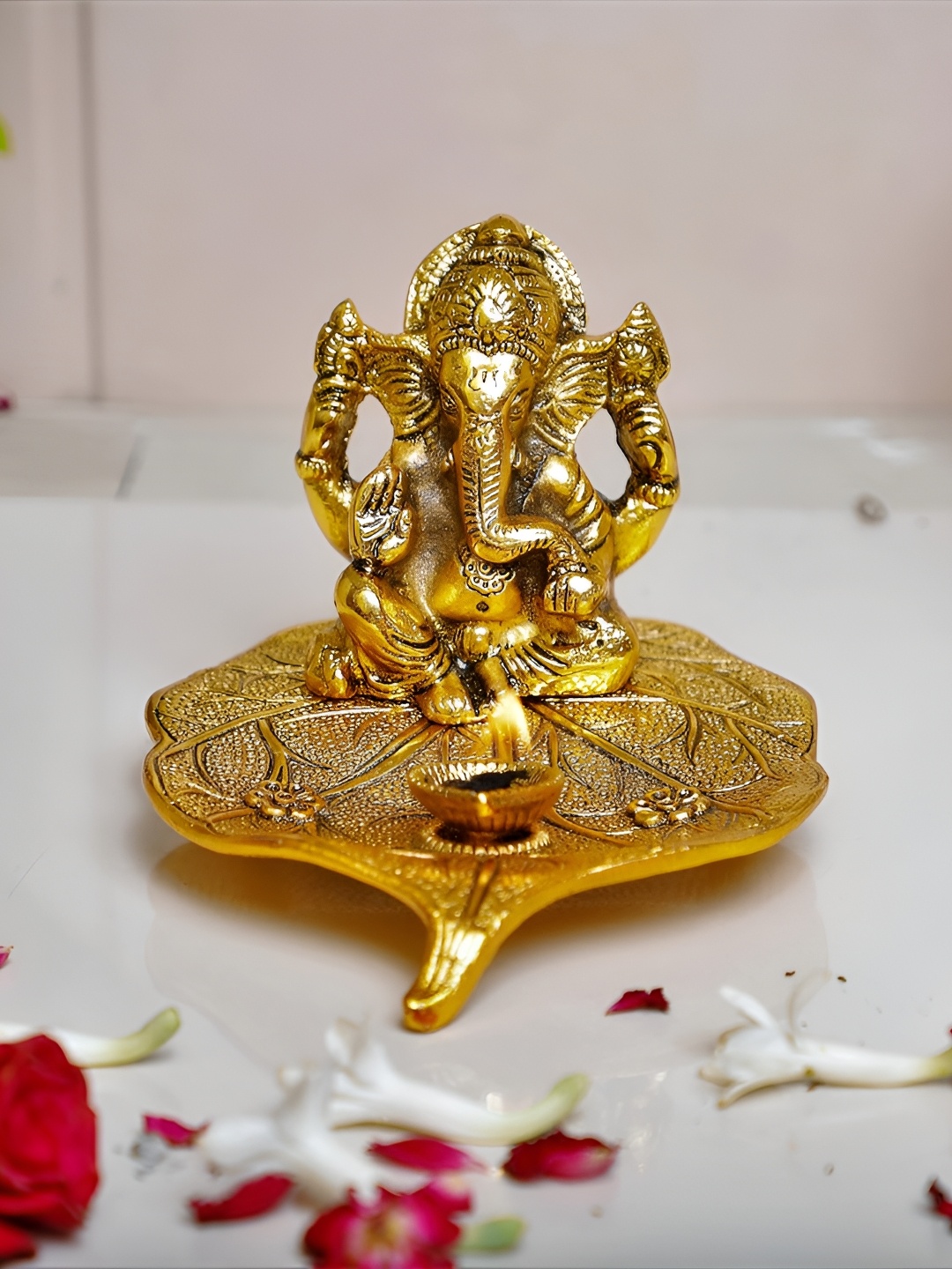 

Kridaykraft Gold Toned Lord Ganesha Religious Idol Showpiece