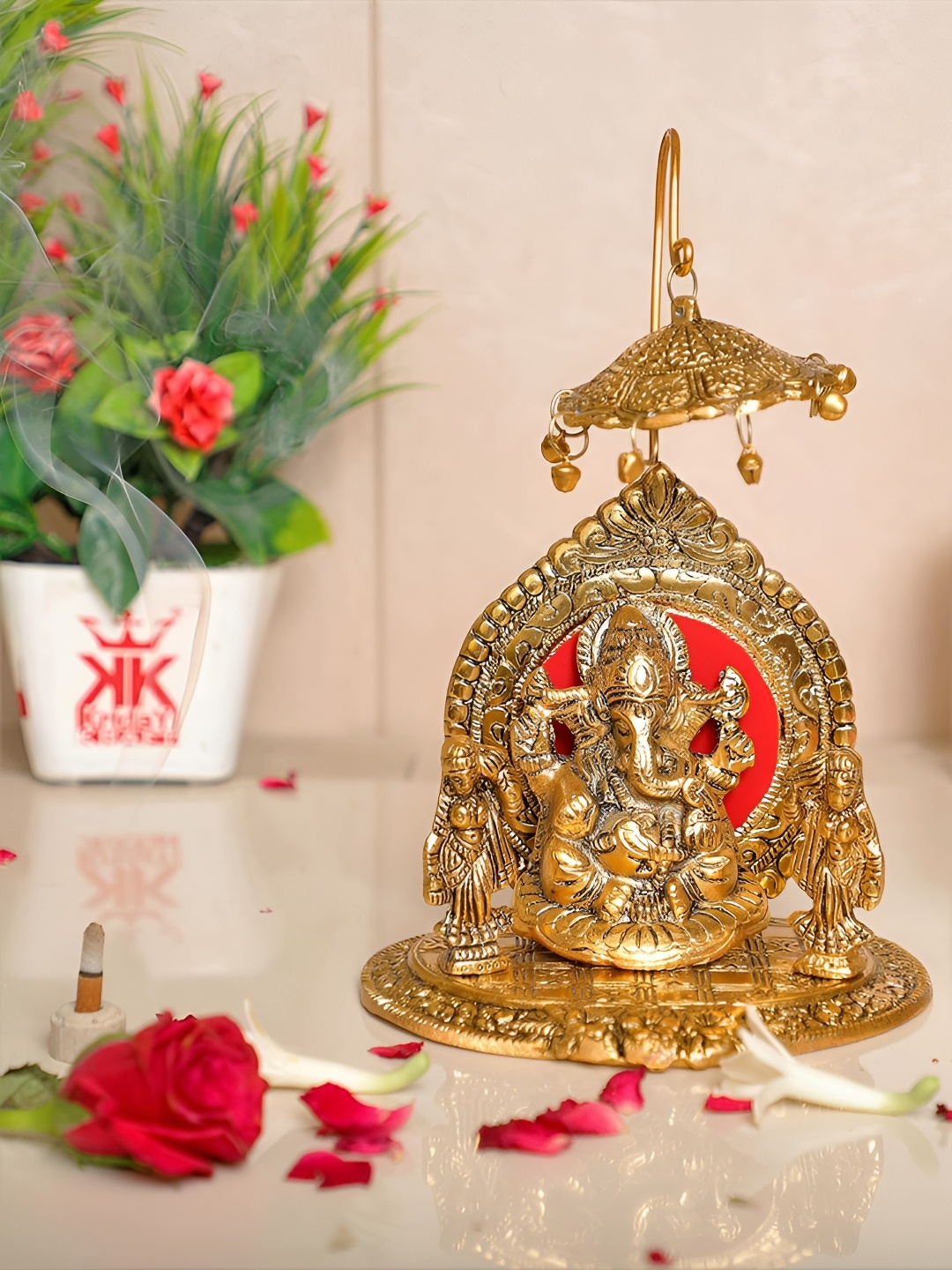 

Kridaykraft Gold Toned & Red Metal Religious Idol Showpiece