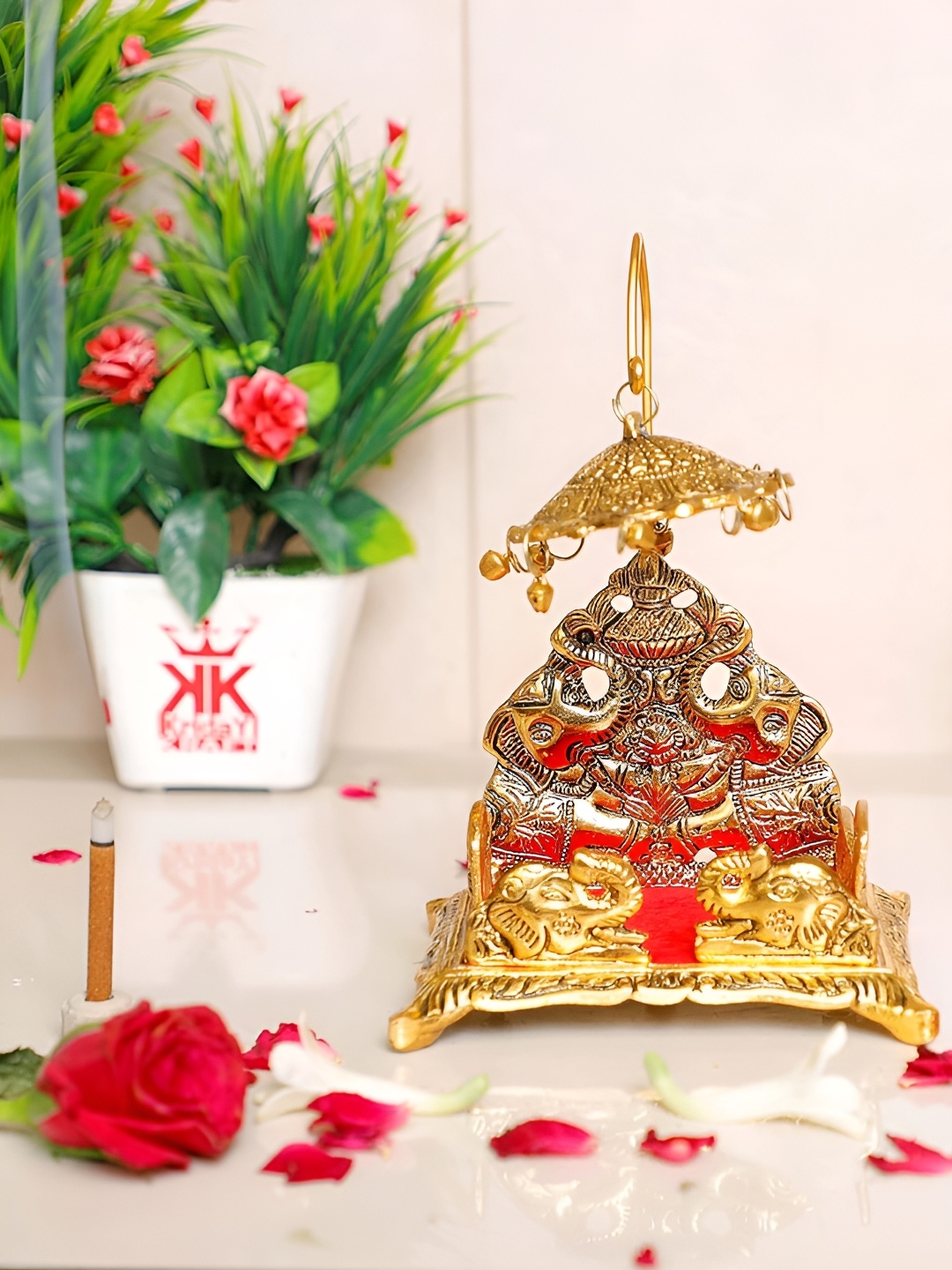 

Kridaykraft Gold-Toned Laddu Gopal Singhasan Showpiece