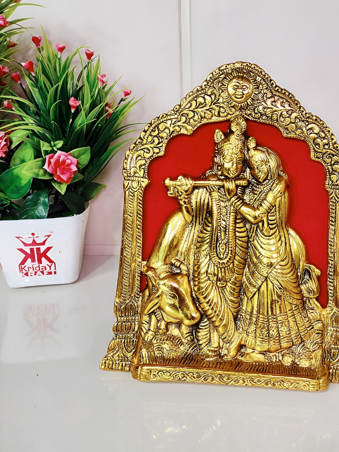 

Kridaykraft Gold Toned & Red Radha Krishna Religious Idol Showpiece