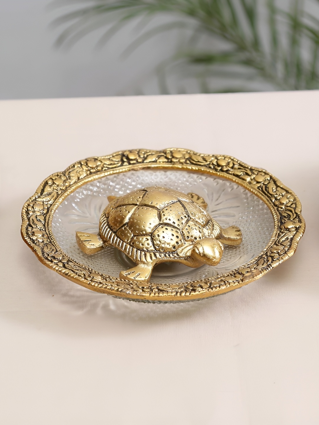 

Kridaykraft Gold Toned & White Tortoise In A Plate Textured Tiny Figurine Showpiece