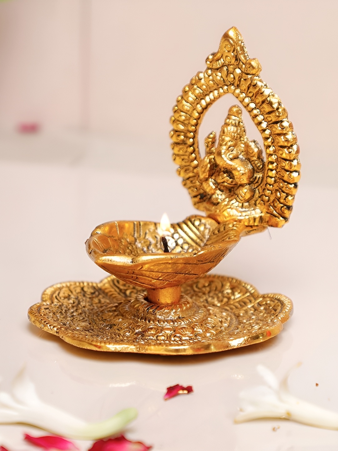 

Kridaykraft Gold-Toned Ganesh with Diya Showpiece