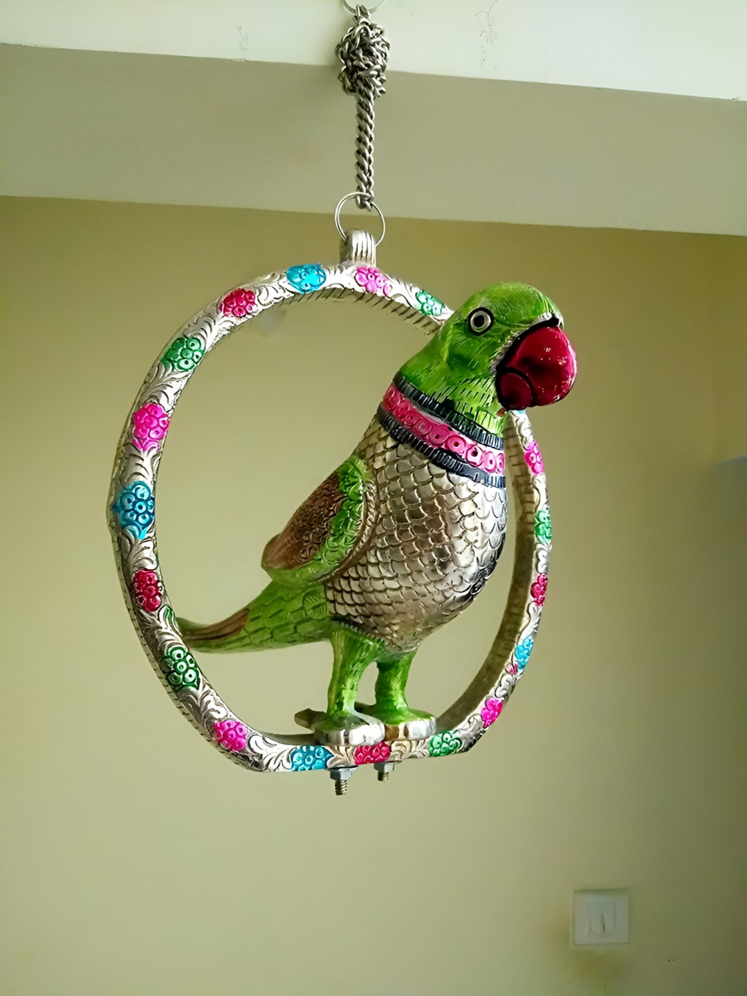 

Kridaykraft Silver-Toned & Green Hanging Parrot Showpiece