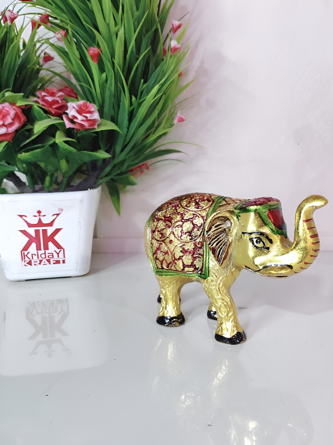 

Kridaykraft Gold-toned & Green Elephant Showpiece