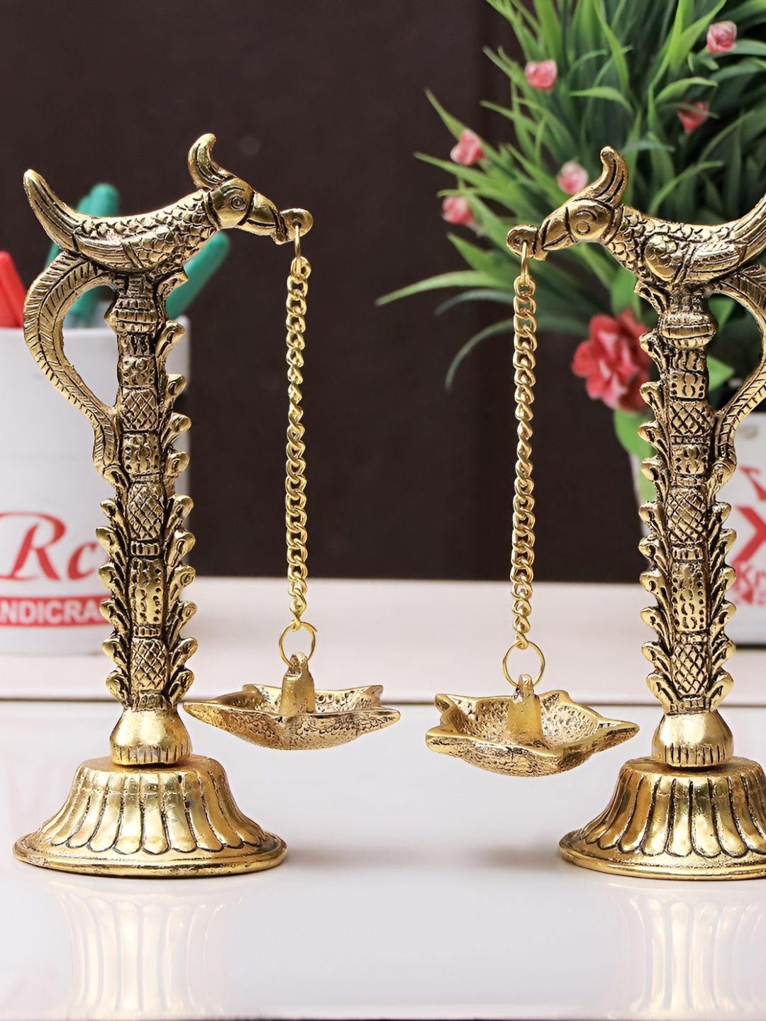 

Kridaykraft Gold-Toned 2 Pieces Parrot Hanging Diya Showpiece