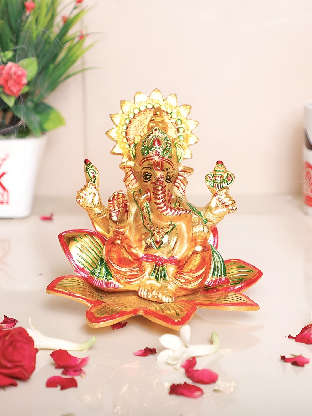 

Kridaykraft Gold Toned & Red Lord Ganesha Religious Small Idol Showpiece