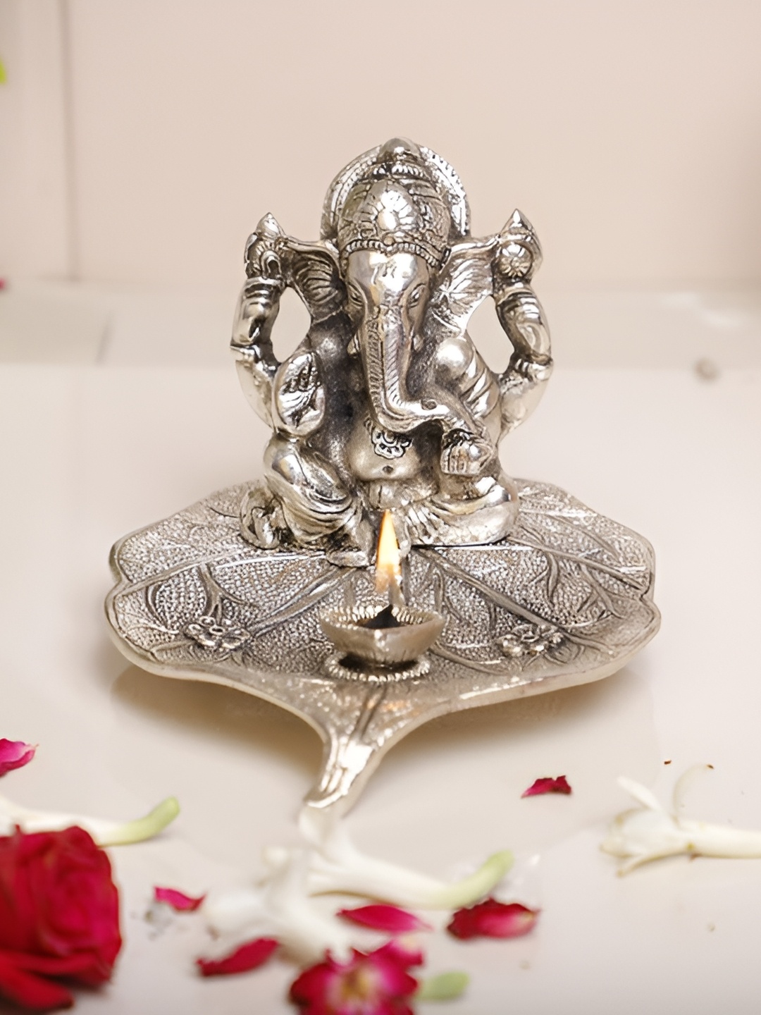 

Kridaykraft Silver Toned Lord Ganesha Religious Idol Showpiece